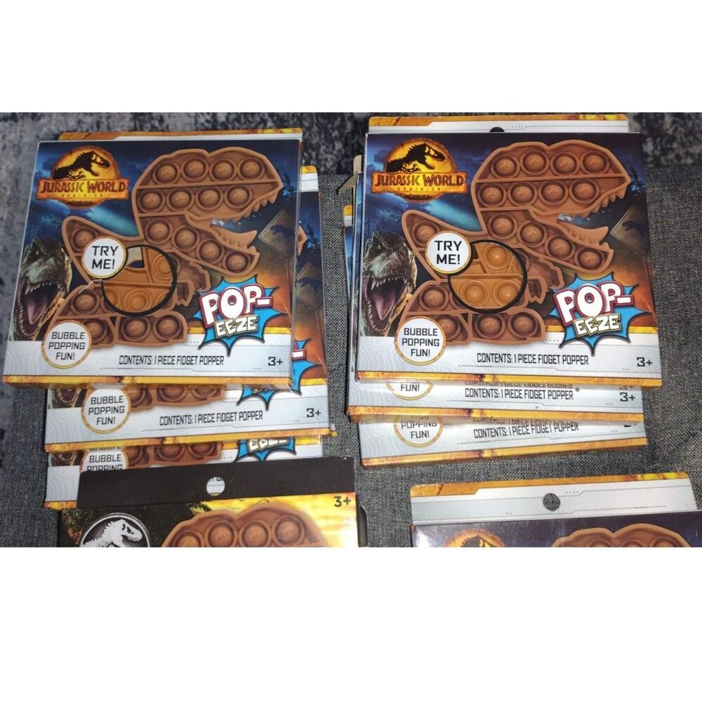 NIP Brown T-Rex Pop-Eeze Fidget Popper Toy By Jurassic World Dinosaur Pack of 1
